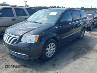 2016 Chrysler Town & Country Touring with VIN 2C4RC1BG8GR297243, listed as a IAAI auction lot 42143705 with 140,728 mi miles. Bid and sale history available at carsss.com. Image 17.