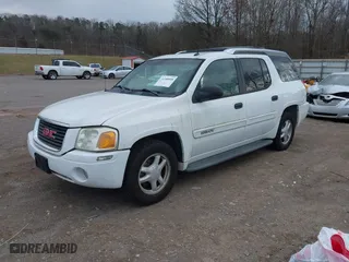 2004 GMC Envoy XUV SLE with VIN 1GKES12S846143483, listed as a IAAI auction lot 41500608 with 242,926 mi miles. Bid and sale history available at carsss.com. Image 2.