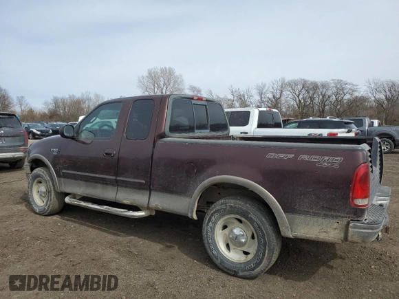 2001 Ford F-150 XL with VIN 1FTRX18L61NB40999, listed as a Copart auction lot 49641305 with 216,452 mi miles and Salvage Title. Bid and sale history available at carsss.com. Image 2.
