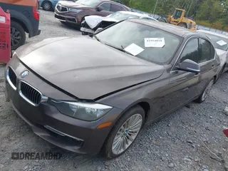 2012 BMW 3 Series 328i with VIN WBA3A5C5XCF349888, listed as a IAAI auction lot 41954810 with 163,070 mi miles. Bid and sale history available at carsss.com. Image 2.