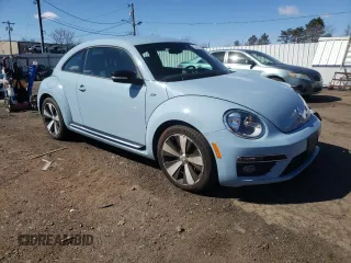 2014 Volkswagen Beetle Turbo R-Line with VIN 3VWVT7AT1EM639374, listed as a Copart auction lot 50230785 with 54,818 mi miles and Salvage Title. Bid and sale history available at DreamBid. Image 4.