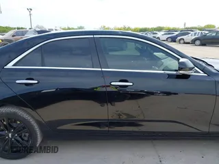 2021 Cadillac CT4 Luxury z VIN 1G6DK5RK6M0106605, wystawiony jako IAAI lot #42037889 z przebiegiem 50 236 mil mil oraz . Historia ofert i sprzedaży dostępna na DreamBid. Obrazek 13.