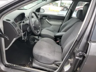 2005 Ford Focus S with VIN 3FAFP37N75R120187, listed as a Copart auction lot 57390605 with 163,547 mi miles and Salvage title. Bid and sale history available at DreamBid. Image 7.