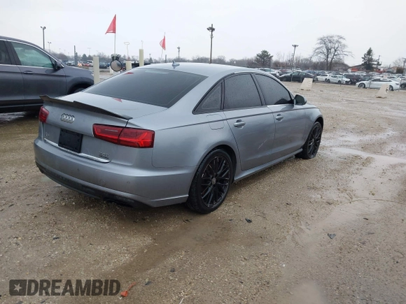 2016 Audi A6 2.0T Premium Plus with VIN WAUGFAFC1GN014536, listed as a IAAI auction lot 41937616 with 122,417 mi miles. Bid and sale history available at carsss.com. Image 4.