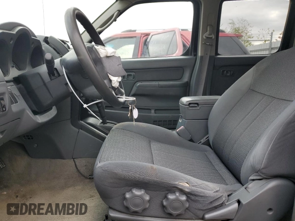 2004 Nissan Frontier XE z VIN 1N6ED27T04C465904, wystawiony jako Copart lot #84096194 z przebiegiem 194 275 mil mil oraz Szkoda całkowita • Salvage title. Historia ofert i sprzedaży dostępna na DreamBid. Obrazek 7.