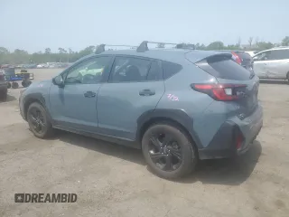 2024 Subaru Crosstrek with VIN JF2GUABC1R8295061, listed as a Copart auction lot 59364855 with 8,877 mi miles and Salvage title. Bid and sale history available at DreamBid. Image 2.
