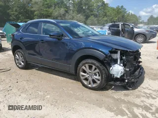 2024 Mazda CX-30 S Carbon Edition with VIN 3MVDMBCM2RM678452, listed as a Copart auction lot 61675535 with 9,573 mi miles and Salvage title. Bid and sale history available at DreamBid. Image 4.