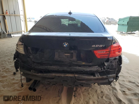 2015 BMW 4 Series 428i z VIN WBA4A9C57FD416121, wystawiony jako Copart lot #53475555 z przebiegiem 186 572 mil mil oraz Szkoda całkowita • Salvage title. Historia ofert i sprzedaży dostępna na DreamBid. Obrazek 6.