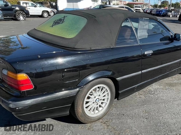 1997 BMW 3-Series 328IC with VIN WBABK8324VET98240, listed as a Copart auction lot 52457785 with 1 mi miles and Clean Title. Bid and sale history available at carsss.com. Image 4.