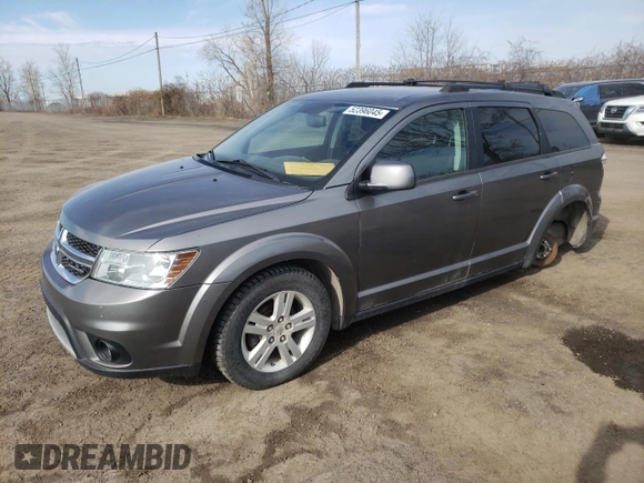 2012 Dodge Journey SXT z VIN 3C4PDCCGXCT177675, wystawiony jako Copart lot #52396045 z przebiegiem 168 203 mil mil oraz Szkoda całkowita • Salvage title. Historia ofert i sprzedaży dostępna na DreamBid. Obrazek 1.