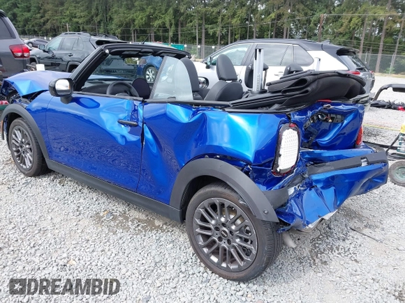 2025 MINI Convertible with VIN WMW23GX01S2X08664, listed as a IAAI auction lot 42506008 with 1,641 mi miles and . Bid and sale history available at DreamBid. Image 3.