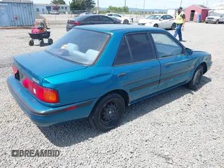 1994 Mazda Protege z VIN JM1BG224XR0709466, wystawiony jako IAAI lot #42413420 z przebiegiem 65 828 mil mil oraz . Historia ofert i sprzedaży dostępna na DreamBid. Obrazek 4.