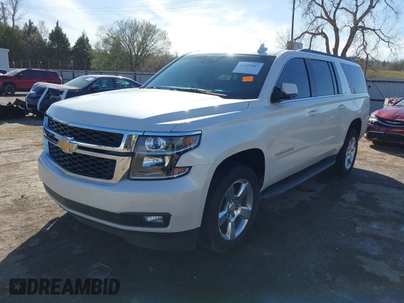 2015 Chevrolet Suburban LT with VIN 1GNSKJKC9FR717038, listed as a IAAI auction lot 41815942 with 123,095 mi miles and . Bid and sale history available at DreamBid. Image 18.