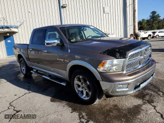 2009 Dodge Ram 1500 SLT with VIN 1D3HB13T29S796820, listed as a Copart auction lot 87319154 with 136,688 mi miles and Salvage Title. Bid and sale history available at carsss.com. Image 4.