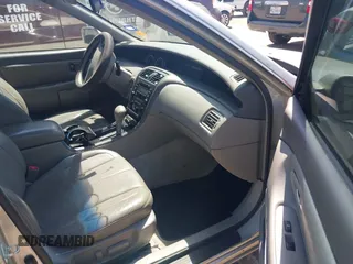 2000 Toyota Avalon XL with VIN 4T1BF28B5YU027140, listed as a IAAI auction lot 42005055 with 138,364 mi miles and . Bid and sale history available at DreamBid. Image 5.