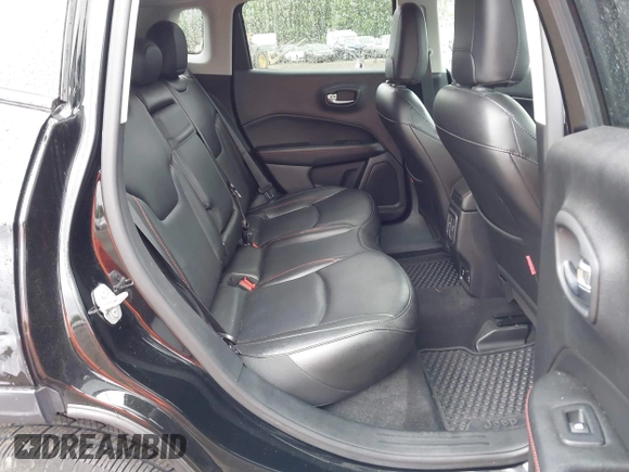 2019 Jeep Compass Trailhawk with VIN 3C4NJDDB7KT727762, listed as a IAAI auction lot 42299260 with 56,733 mi miles and . Bid and sale history available at DreamBid. Image 8.