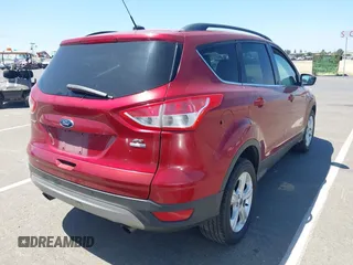 2014 Ford Escape SE z VIN 1FMCU9GX3EUB64623, wystawiony jako IAAI lot #42560923 z przebiegiem 120 730 mil mil oraz . Historia ofert i sprzedaży dostępna na DreamBid. Obrazek 4.