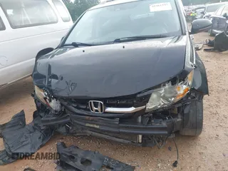 2015 Honda Odyssey Touring Elite with VIN 5FNRL5H90FB065004, listed as a IAAI auction lot 42461597 with 317,523 mi miles and . Bid and sale history available at DreamBid. Image 12.
