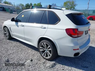 2015 BMW X5 xDrive50i with VIN 5UXKR6C5XF0J76697, listed as a IAAI auction lot 41953074 with 141,377 mi miles and . Bid and sale history available at DreamBid. Image 3.