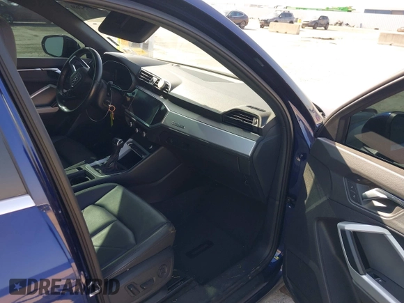 2021 Audi Q3 Premium with VIN WA1AUCF32M1066149, listed as a IAAI auction lot 40695269 with 92,598 mi miles and . Bid and sale history available at DreamBid. Image 5.