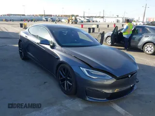 2021 Tesla Model S Long Range with VIN 5YJSA1E53MF436865, listed as a IAAI auction lot 41384837 with 20,829 mi miles and . Bid and sale history available at DreamBid. Image 1.
