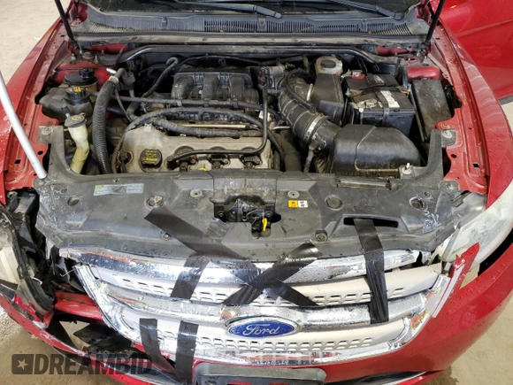 2012 Ford Taurus Limited z VIN 1FAHP2FWXCG104471, wystawiony jako Copart lot #54731335 z przebiegiem 221 397 mil mil oraz Szkoda całkowita • Salvage title. Historia ofert i sprzedaży dostępna na DreamBid. Obrazek 11.