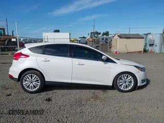 2017 Ford Focus Titanium with VIN 1FADP3N24HL308751, listed as a IAAI auction lot 42207247 with 109,736 mi miles and . Bid and sale history available at DreamBid. Image 14.