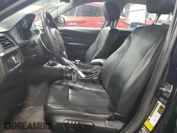 2015 BMW 3 Series 328i xDrive with VIN WBA3B3C50FJ984086, listed as a Copart auction lot 52006475 with 147,065 mi miles and Salvage Title. Bid and sale history available at carsss.com. Image 7.