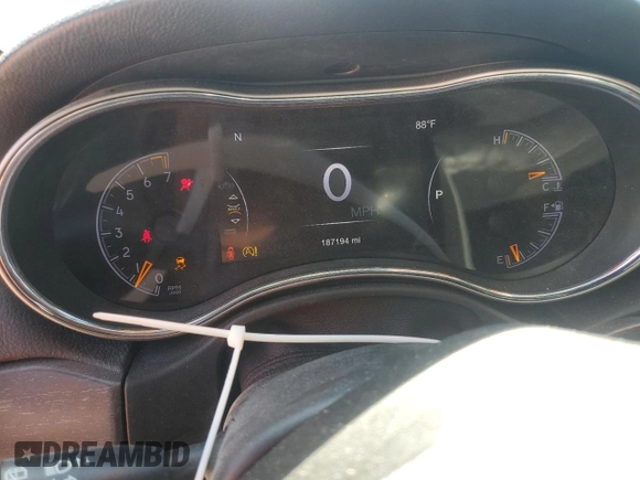 2017 Jeep Grand Cherokee Altitude with VIN 1C4RJFAG4HC919335, listed as a Copart auction lot 56529825 with 187,194 mi miles and Salvage title. Bid and sale history available at DreamBid. Image 9.