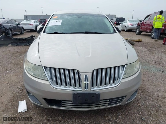 2009 Lincoln MKS with VIN 1LNHM93R79G626392, listed as a IAAI auction lot 41713232 with 130,136 mi miles. Bid and sale history available at carsss.com. Image 13.