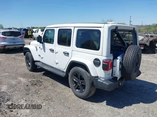 2021 Jeep Wrangler Unlimited Sahara z VIN 1C4HJXEN2MW528137, wystawiony jako IAAI lot #42134514 z przebiegiem 50 030 mil mil oraz . Historia ofert i sprzedaży dostępna na DreamBid. Obrazek 3.