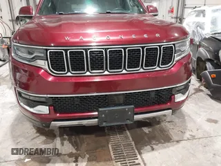 2022 Jeep Wagoneer Series III with VIN 1C4SJVDT4NS113100, listed as a IAAI auction lot 41727706 with 64,694 mi miles and . Bid and sale history available at DreamBid. Image 6.