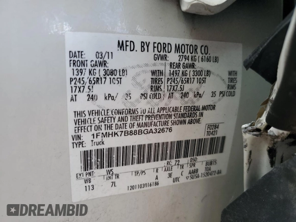 2011 Ford Explorer z VIN 1FMHK7B88BGA32676, wystawiony jako Copart lot #58189675 z przebiegiem 94 088 mil mil oraz Szkoda całkowita • Salvage title. Historia ofert i sprzedaży dostępna na DreamBid. Obrazek 13.