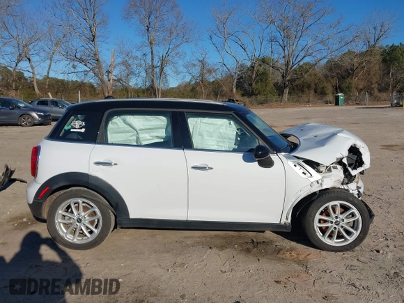 2015 MINI Countryman z VIN WMWZB3C53FWR43884, wystawiony jako IAAI lot #41296213 z przebiegiem 111 934 mil mil oraz . Historia ofert i sprzedaży dostępna na DreamBid. Obrazek 14.