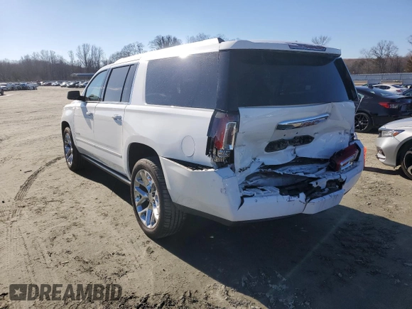 2019 GMC Yukon XL Denali with VIN 1GKS2HKJ2KR103446, listed as a Copart auction lot 88519755 with 77,779 mi miles and Salvage Title. Bid and sale history available at DreamBid. Image 2.