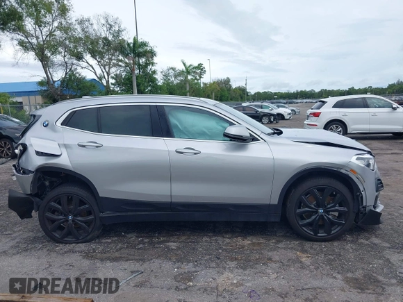 2022 BMW X2 sDrive28i z VIN WBXYH9C09N5T71828, wystawiony jako IAAI lot #40536245 z przebiegiem 36 012 mil mil oraz . Historia ofert i sprzedaży dostępna na DreamBid. Obrazek 14.