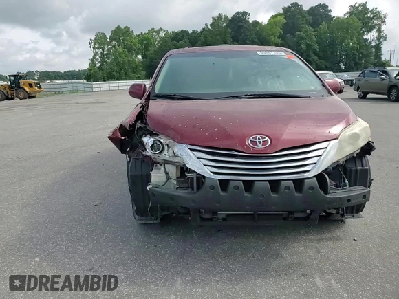 2011 Toyota Sienna XLE with VIN 5TDDK3DCXBS024257, listed as a Copart auction lot 60667145 with 283,609 mi miles and Salvage title. Bid and sale history available at DreamBid. Image 14.