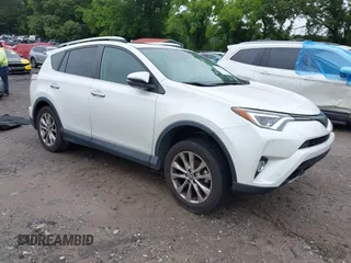 2016 Toyota RAV4 Limited with VIN 2T3YFREV6GW293418, listed as a IAAI auction lot 42367428 with 210,000 mi miles and . Bid and sale history available at DreamBid. Image 1.