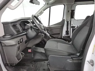 2023 Ford Transit Cargo with VIN 1FTBR1Y86PKB40356, listed as a Copart auction lot 45669345 with 12,890 mi miles and Salvage Title. Bid and sale history available at DreamBid. Image 7.