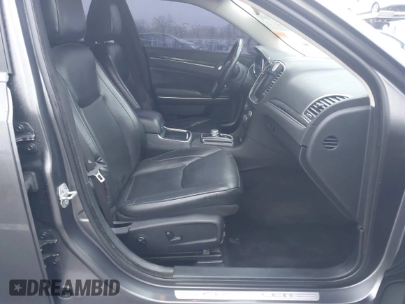 2016 Chrysler 300 with VIN 2C3CCAKG5GH334703, listed as a IAAI auction lot 40877306 with 141,799 mi miles. Bid and sale history available at carsss.com. Image 5.