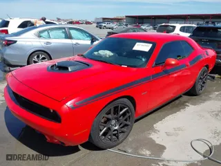 2016 Dodge Challenger R/T with VIN 2C3CDZBT7GH332055, listed as a IAAI auction lot 41744393 with 152,900 mi miles. Bid and sale history available at carsss.com. Image 2.