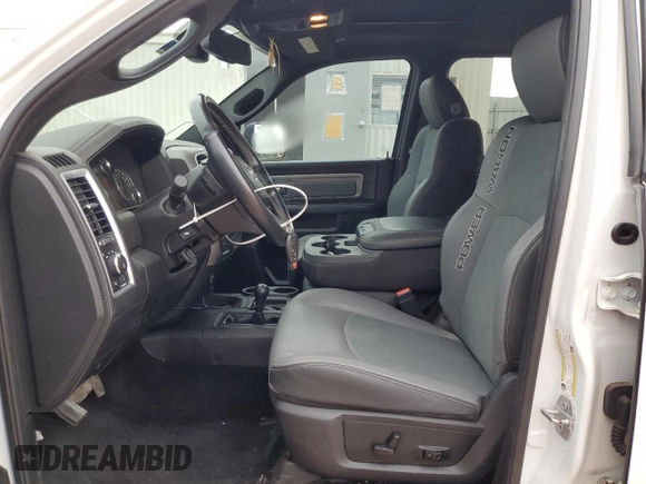 2018 Ram 2500 Power Wagon with VIN 3C6TR5EJ9JG126265, listed as a Copart auction lot 58297795 with 151,867 mi miles and Salvage title. Bid and sale history available at DreamBid. Image 7.