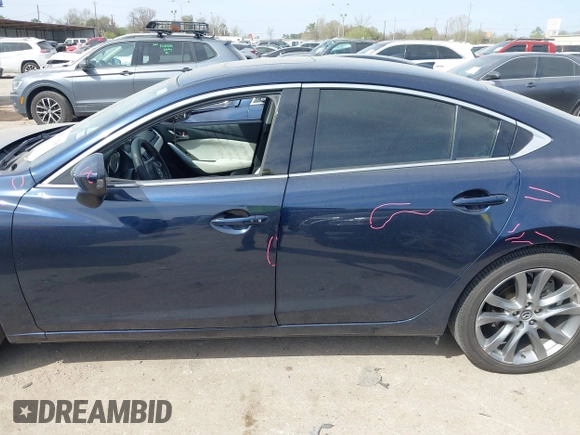2016 Mazda 6 i Grand Touring with VIN JM1GJ1W59G1439075, listed as a IAAI auction lot 41792755 with 99,215 mi miles and . Bid and sale history available at DreamBid. Image 14.
