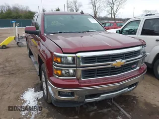 2015 Chevrolet Silverado 1500 LT with VIN 1GCVKREC7FZ370664, listed as a IAAI auction lot 41165298 with 146,935 mi miles. Bid and sale history available at carsss.com. Image 1.