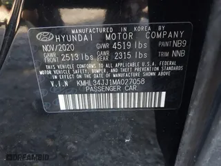 2021 Hyundai Sonata Hybrid SEL with VIN KMHL34JJ1MA027058, listed as a IAAI auction lot 41187431 with 39,437 mi miles. Bid and sale history available at carsss.com. Image 9.