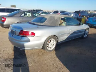 2001 Chrysler Sebring LXi with VIN 1C3EL55U91N660200, listed as a IAAI auction lot 41631756 with 124,867 mi miles and . Bid and sale history available at DreamBid. Image 4.