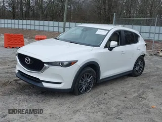 2017 Mazda CX-5 Touring with VIN JM3KFACL8H0205717, listed as a IAAI auction lot 41173725 with 107,604 mi miles. Bid and sale history available at carsss.com. Image 17.