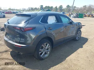 2024 Mazda CX-30 S Carbon Edition z VIN 3MVDMBCM0RM662752, wystawiony jako IAAI lot #42108251 z przebiegiem 17 963 mil mil oraz . Historia ofert i sprzedaży dostępna na DreamBid. Obrazek 4.
