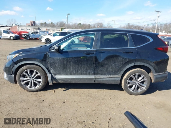 2020 Honda CR-V Touring with VIN 2HKRW2H98LH626651, listed as a IAAI auction lot 41668951 with 64,391 mi miles and . Bid and sale history available at DreamBid. Image 14.