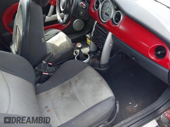 2005 MINI Convertible with VIN WMWRF33445TF61684, listed as a IAAI auction lot 42502576 with 230,939 mi miles and . Bid and sale history available at DreamBid. Image 5.